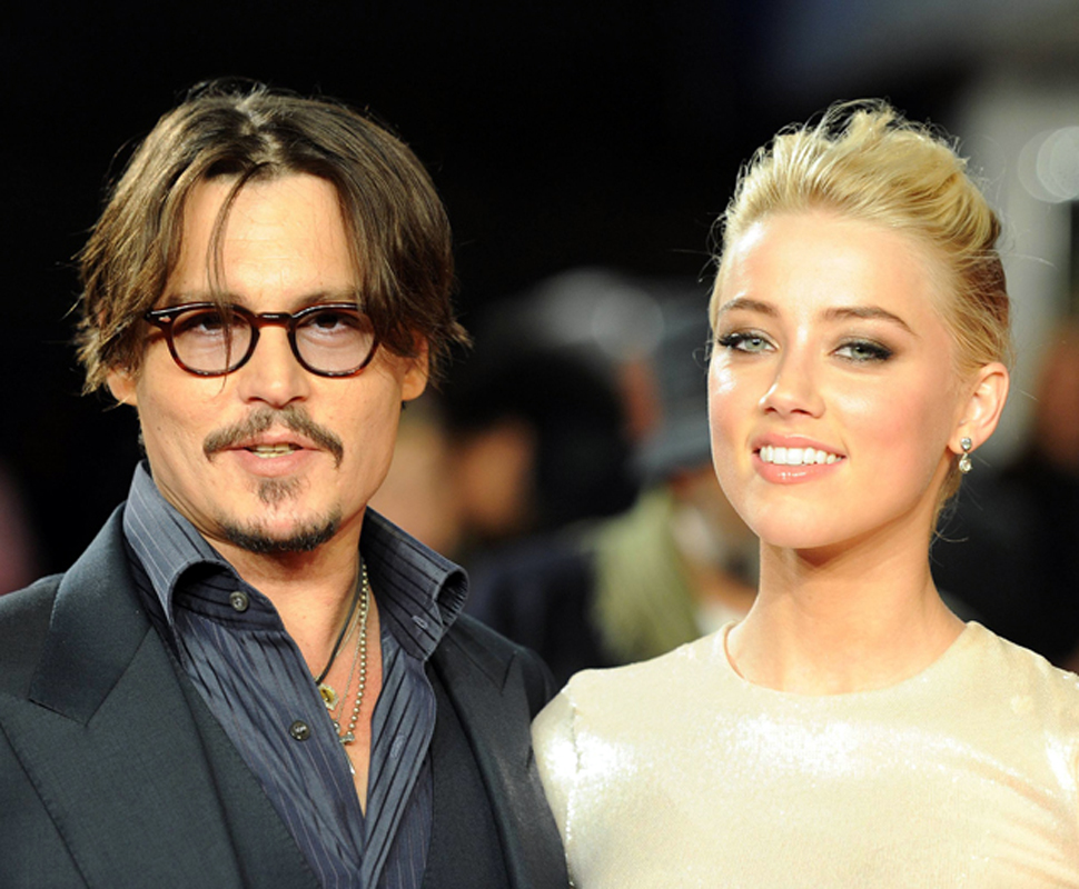 Johnny Depp e Amber Heard - Antestreia «The Rum Diary» em Londres Foto: Reuters